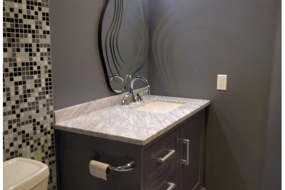 Bathroom vanity with tile and stone countertop